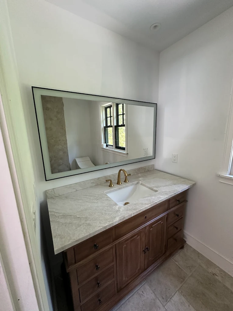 Bathroom with freshly painted walls and a new vanity
